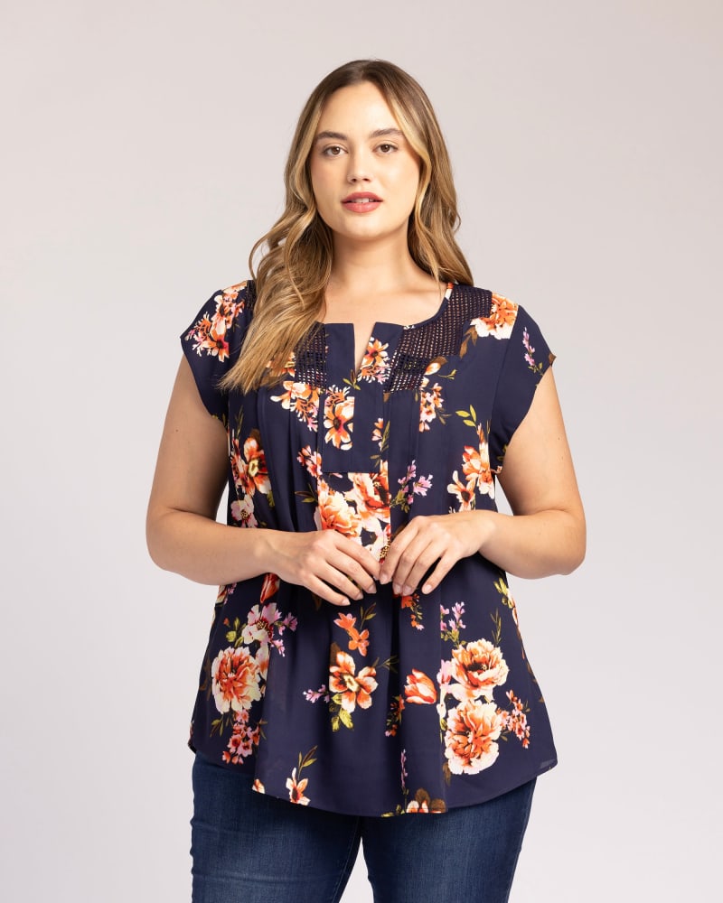 Front of a model wearing a size 2X Luna Floral Split-Neck Blouse in L509 INDIGO by Daniel Rainn. | dia_product_style_image_id:303053